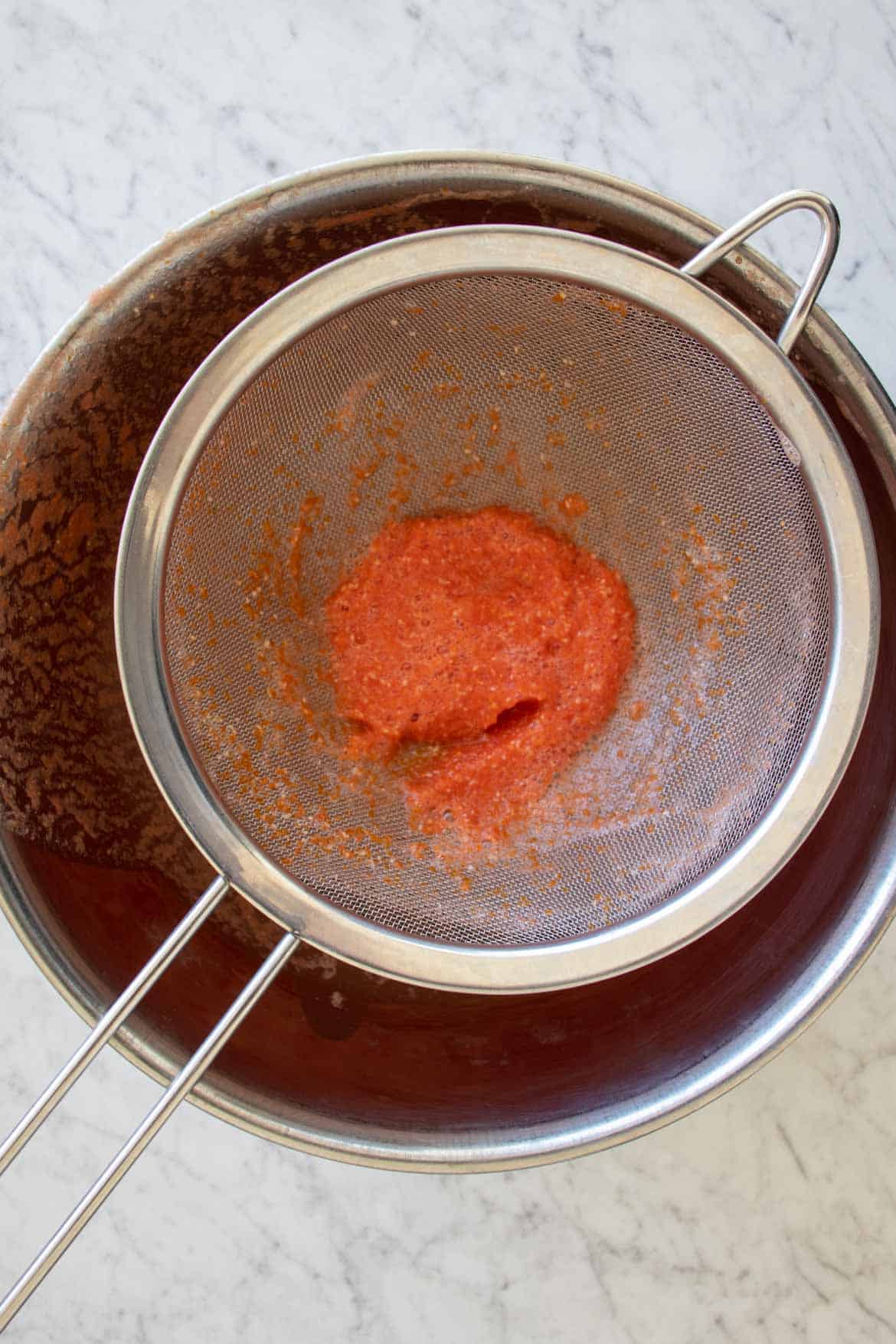 strain tomato puree