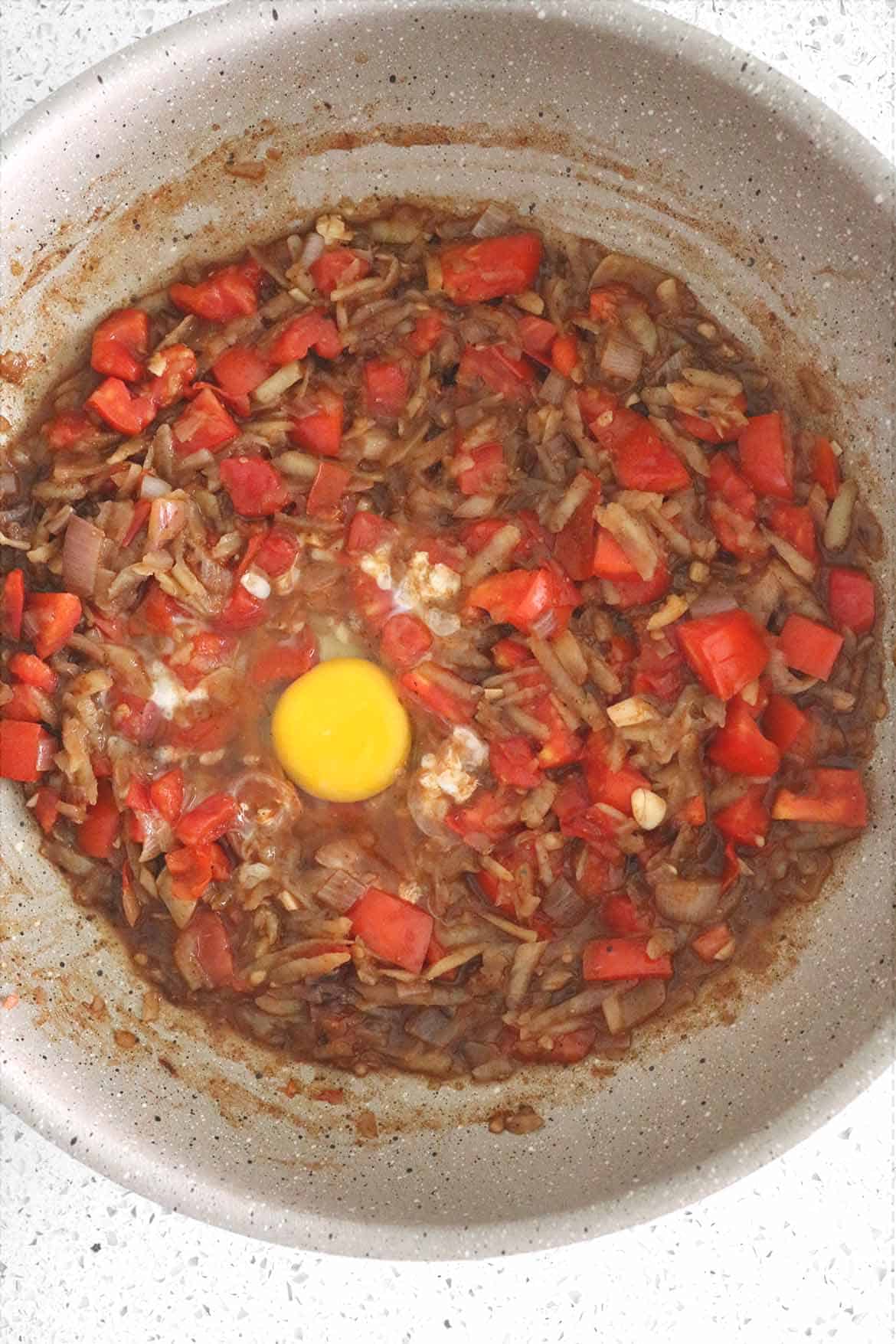 shakshouka eggs with tomatoes and potatoes