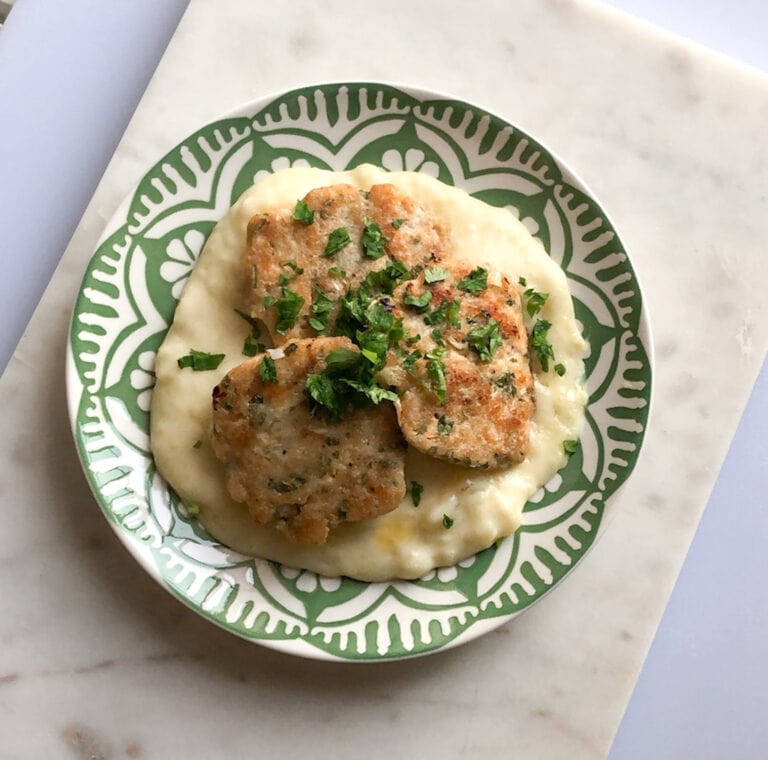 chicken kafta on top of mashed potatoes