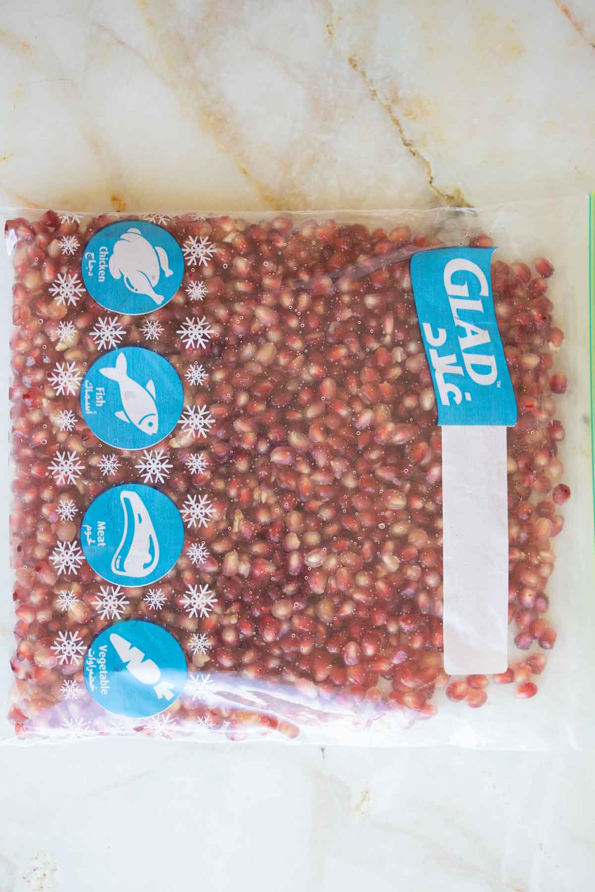 pomegranate seeds in a freezer bag