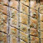 baklava rolls in a pan