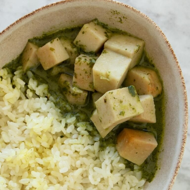 kolkas taro root stew with rice in a bowl