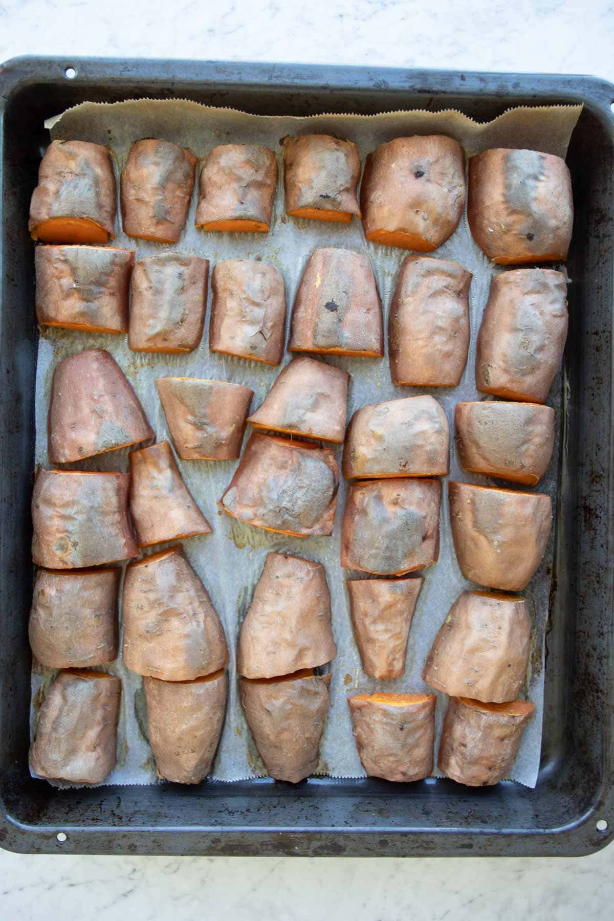 roasted sweet potatoes on a baking tray