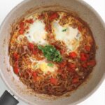shakshuka eggs with potato hash