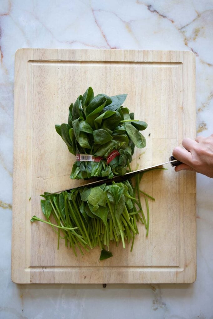 chop the stems of the spinach