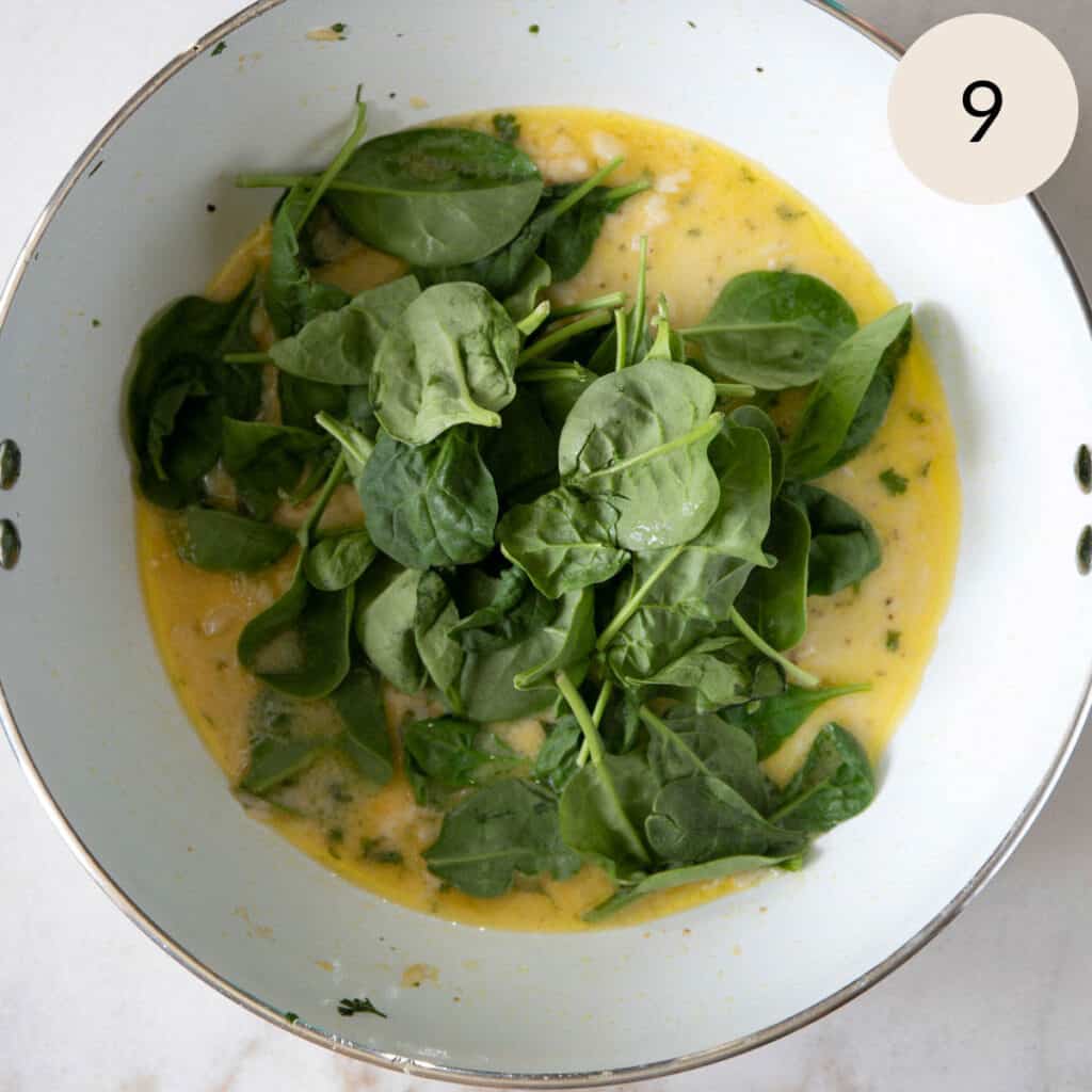 add fresh spinach to the lemon garlic butter