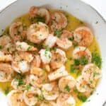 a close up view of sautéed lemon garlic butter shrimp