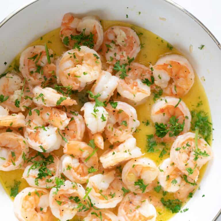 a close up view of sautéed lemon garlic butter shrimp