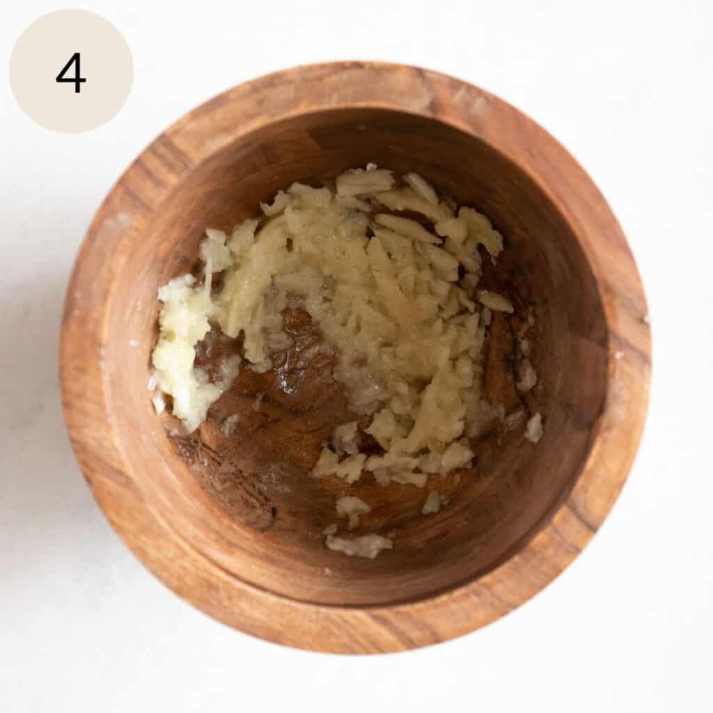 mash the garlic with a mortar and pestle