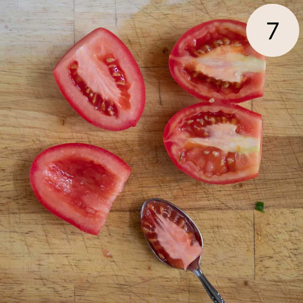 scoop out the seeds of the Roma tomatoes