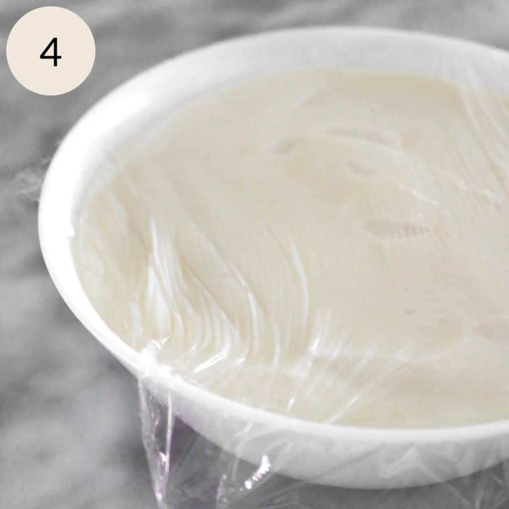 adding a plastic cover to a bowl to prevent a film from forming on the ashta cream