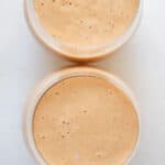 close up view of a pineapple peach and banana smoothie