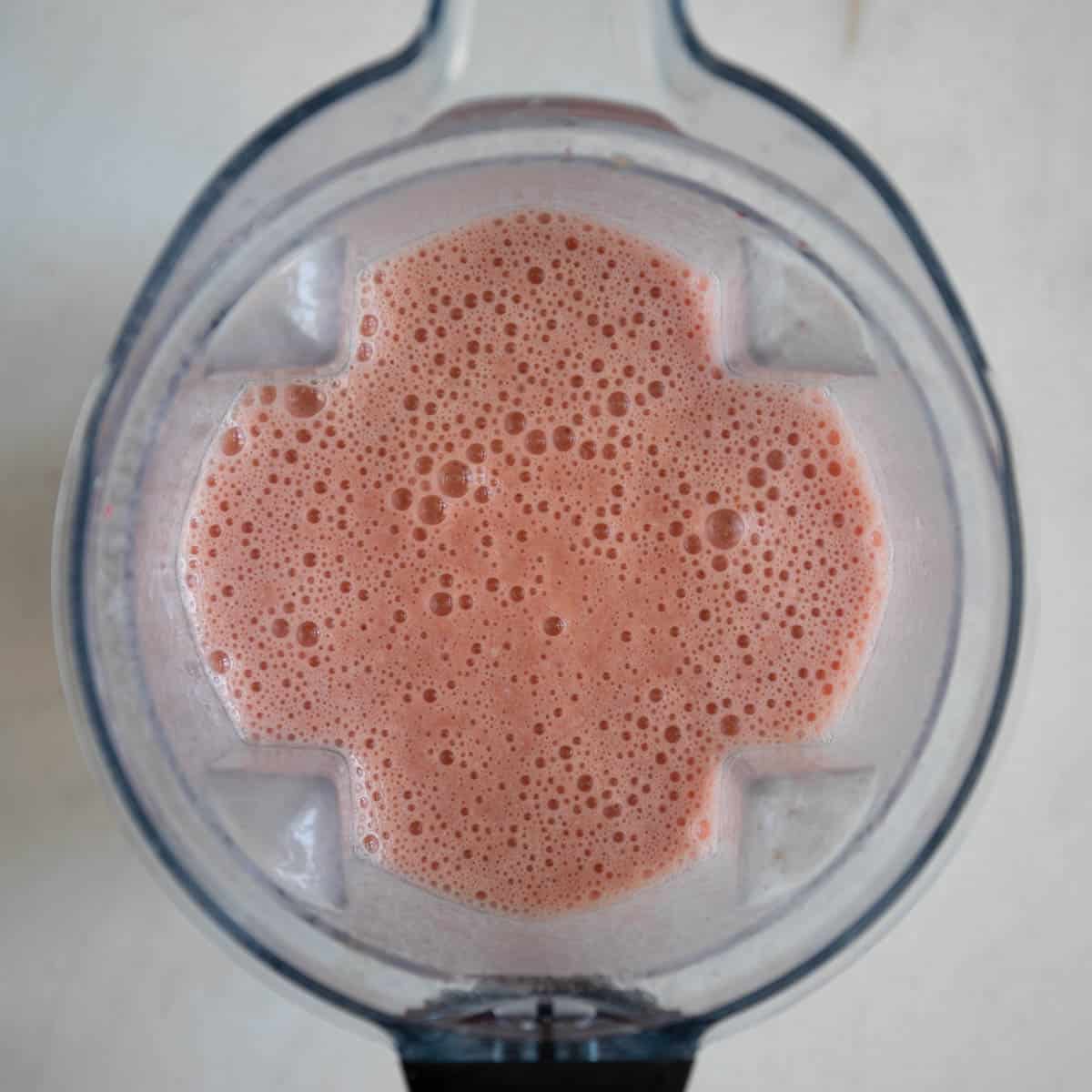 the strawberry smoothie after getting blended in a blender