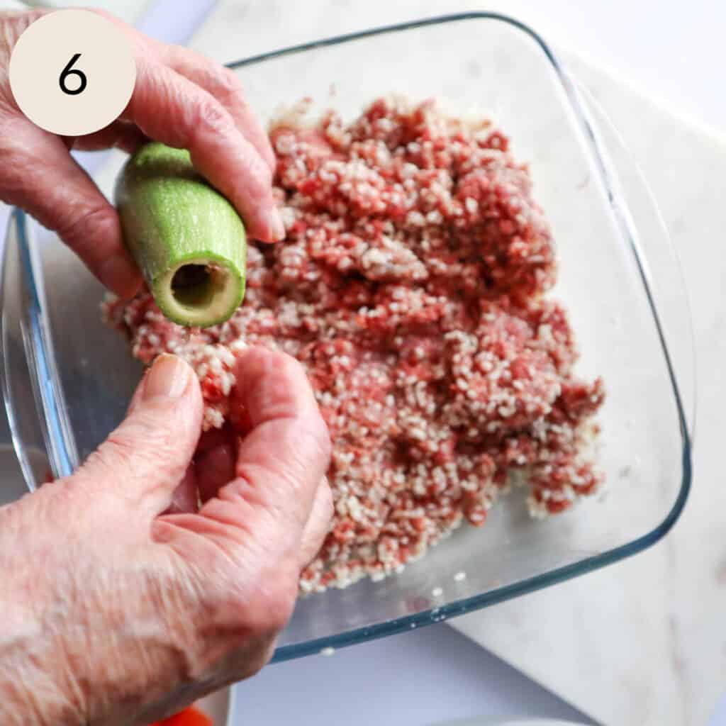 stuff the minced meat into the cored zucchini