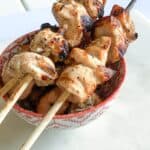 grilled chicken shish tawook skewers in a bowl