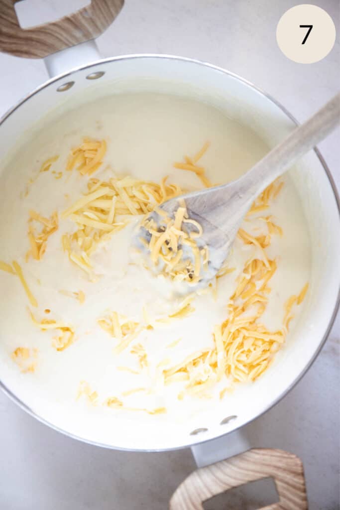 mix the shredded cheese into the bechemal sauce