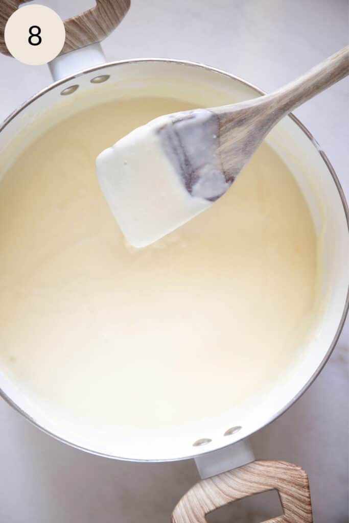remove the mac and cheese sauce from the stovetop when the shredded cheese is melted
