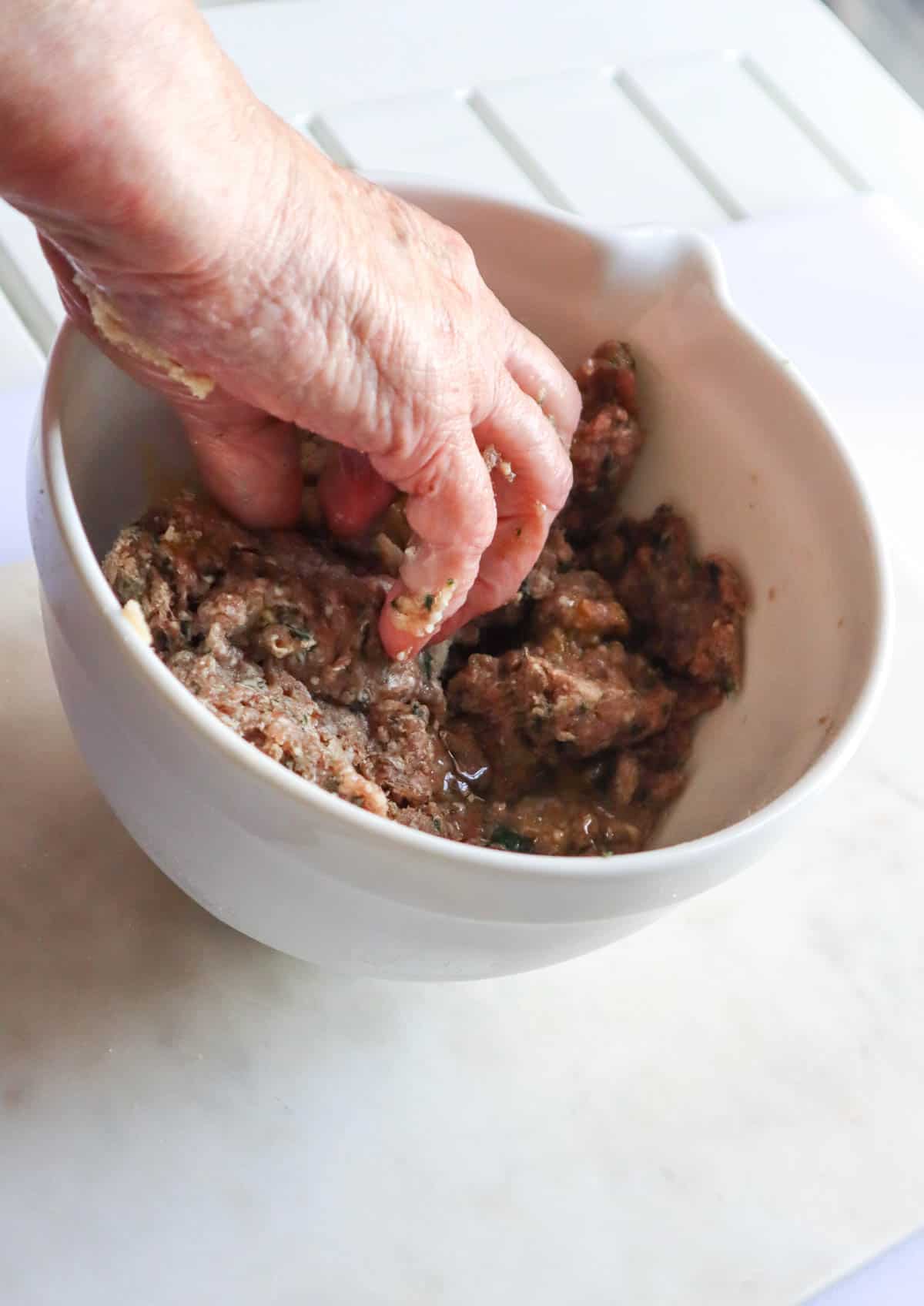 mix the ground meat with your hands