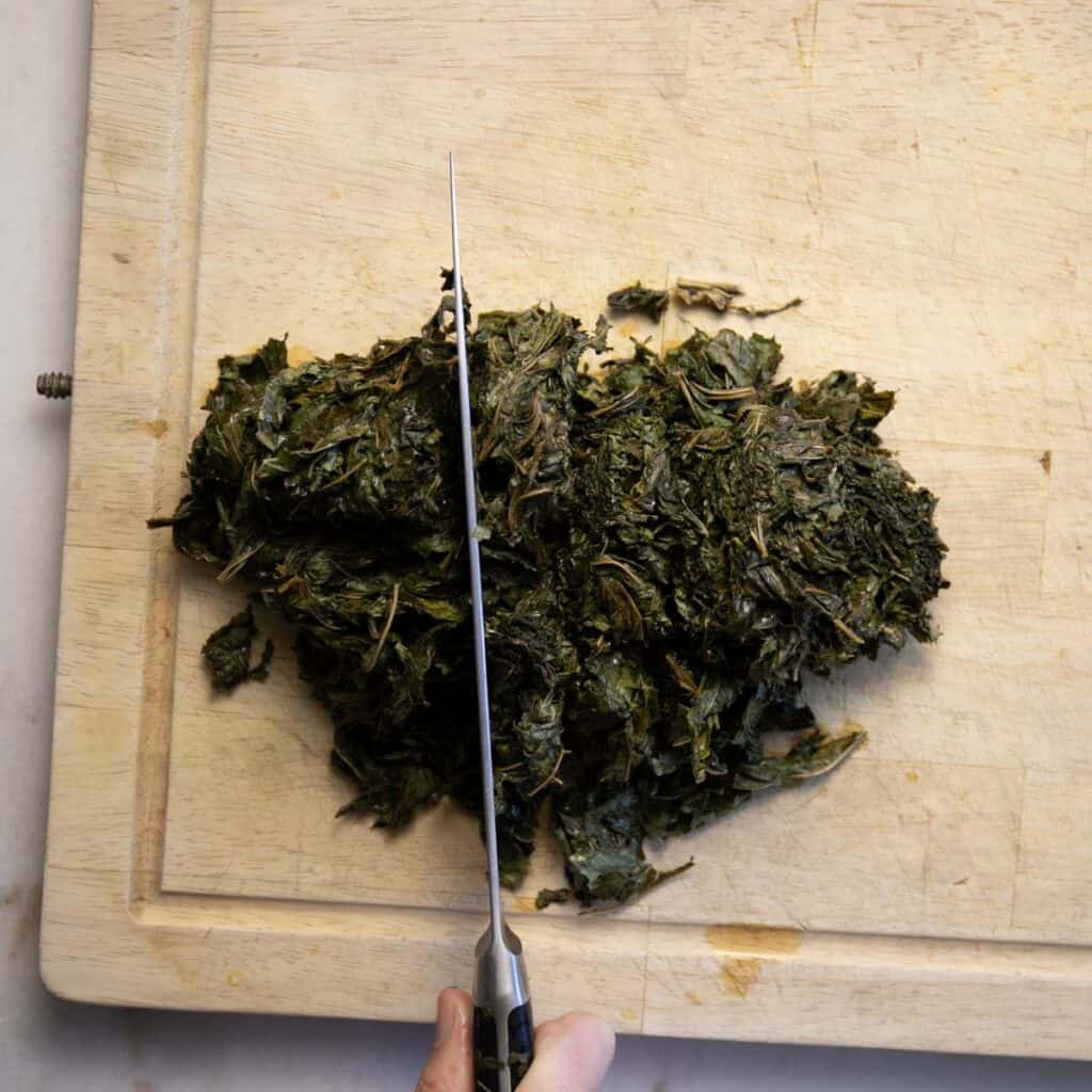 chopping the soaked mloukhieh