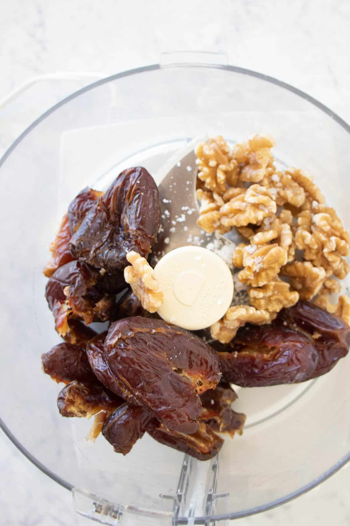 add the dates, walnuts, and sea salt to a food processor