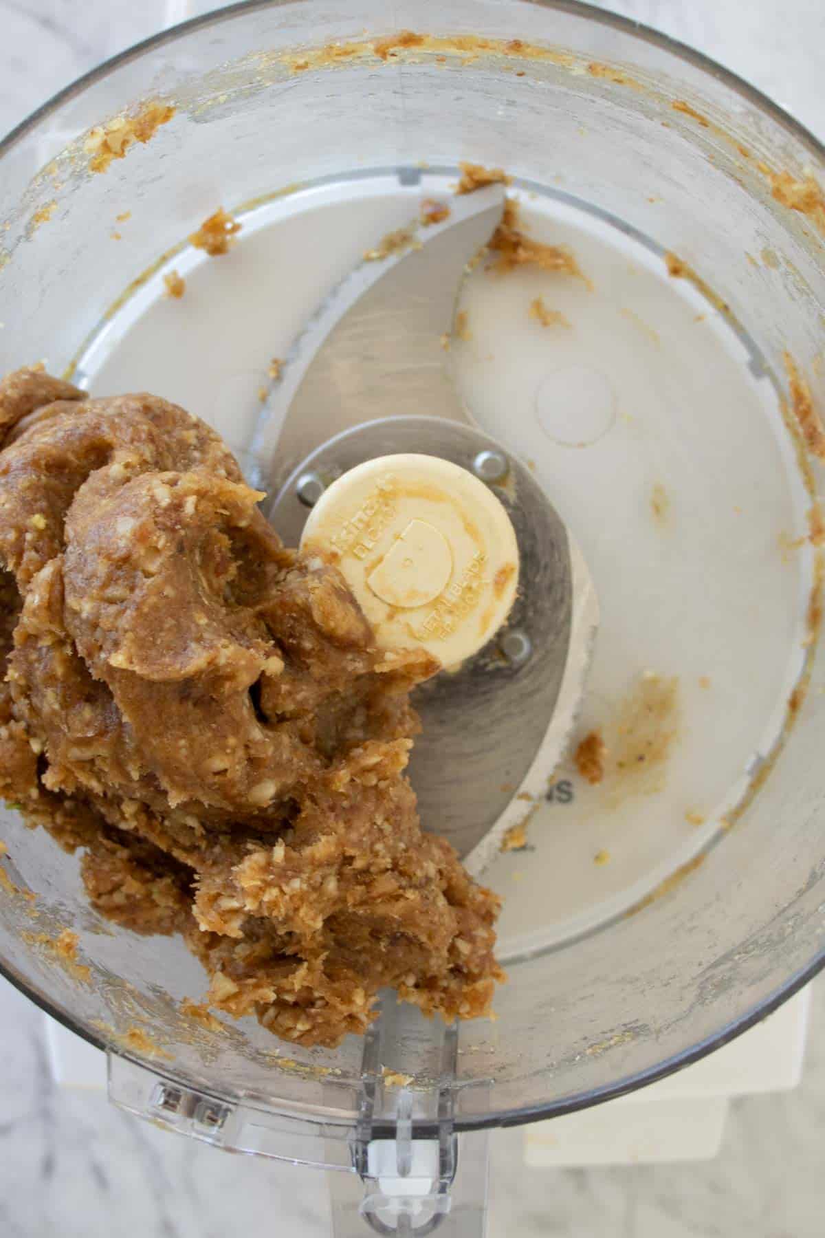 blended walnuts and dates in a food processor