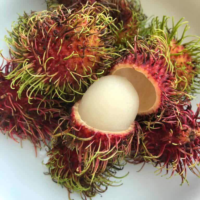 rambutan in a bowl cut open
