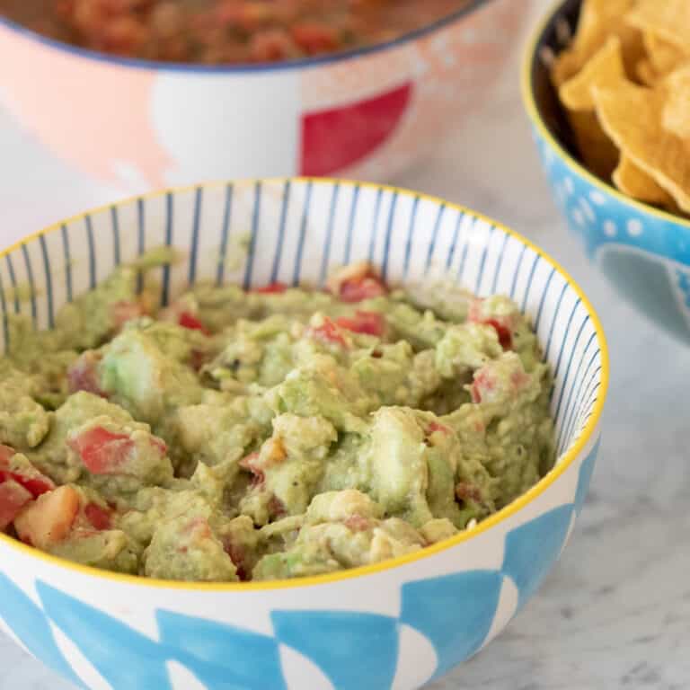 freshly mashed garlic guacamole in a bowl