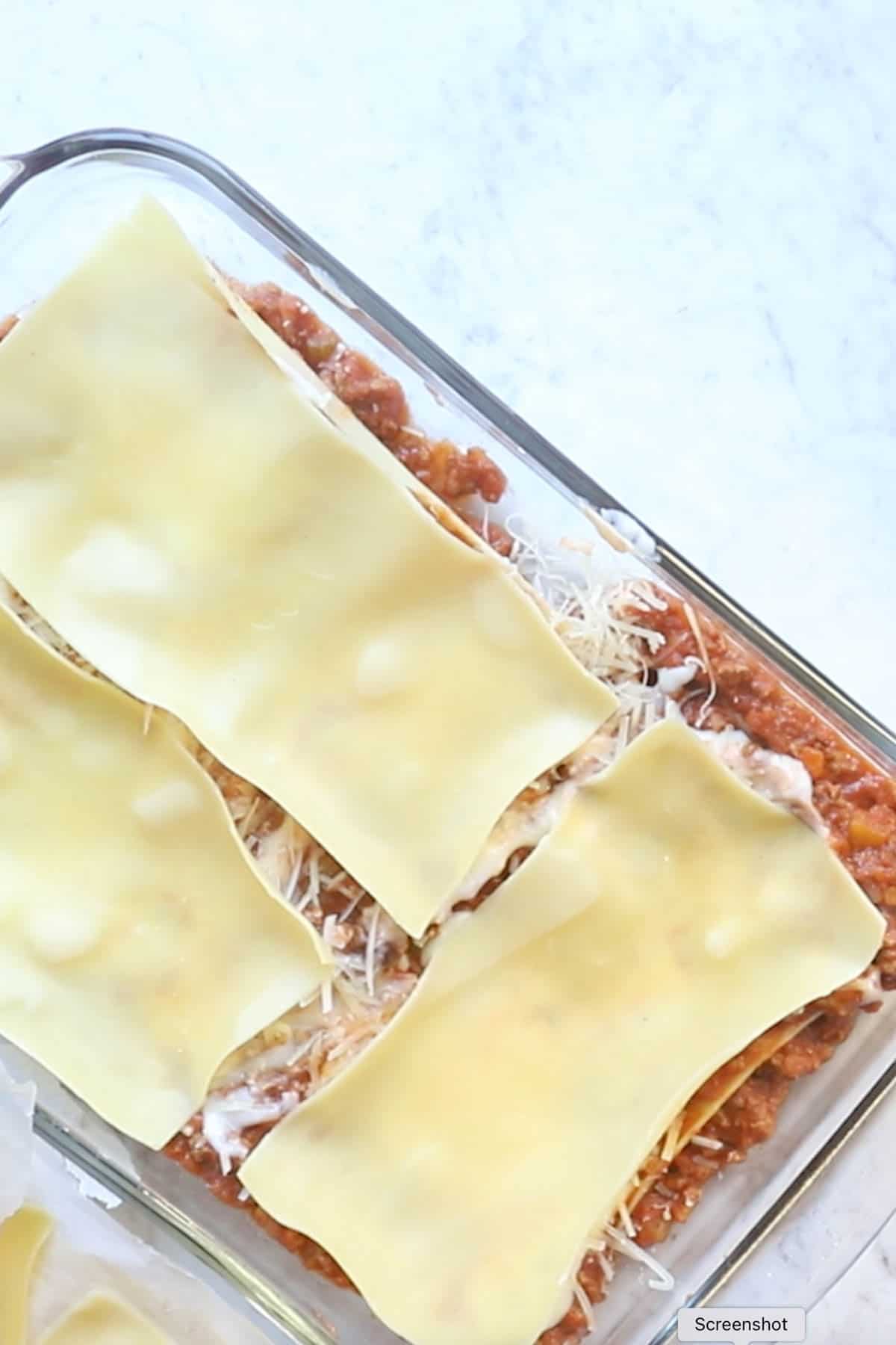 layered boiled oven-ready lasagna noodles.