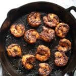 blackened shrimp in a cast iron.