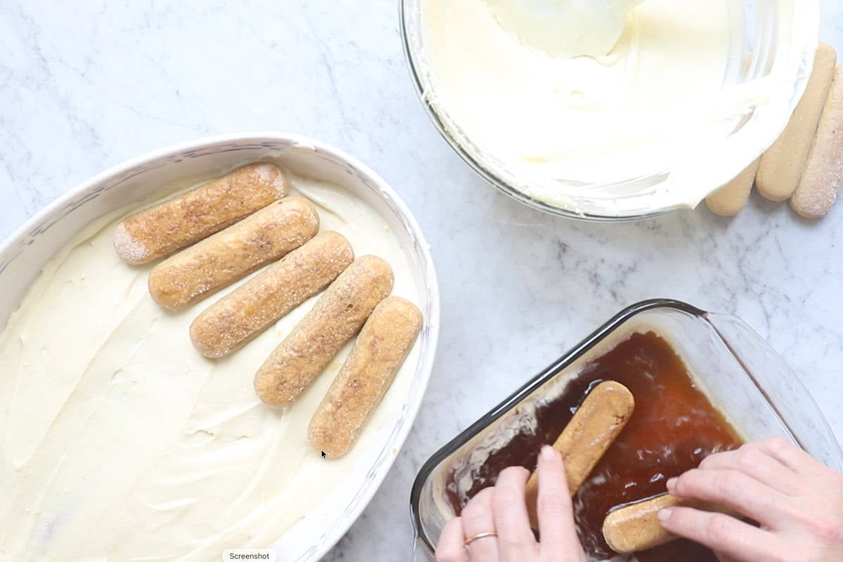soaking the ladyfingers in the coffee mixture.