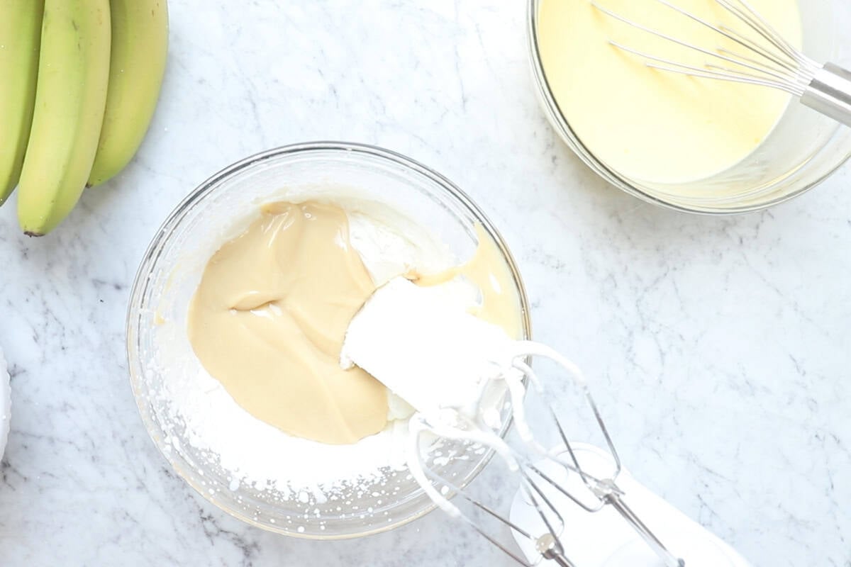 using an electric mixer, beat the softened cream cheese, condensed milk, and whipped cream together until smooth.