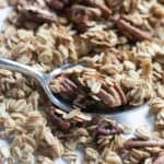 maple pecan granola on a spoon.