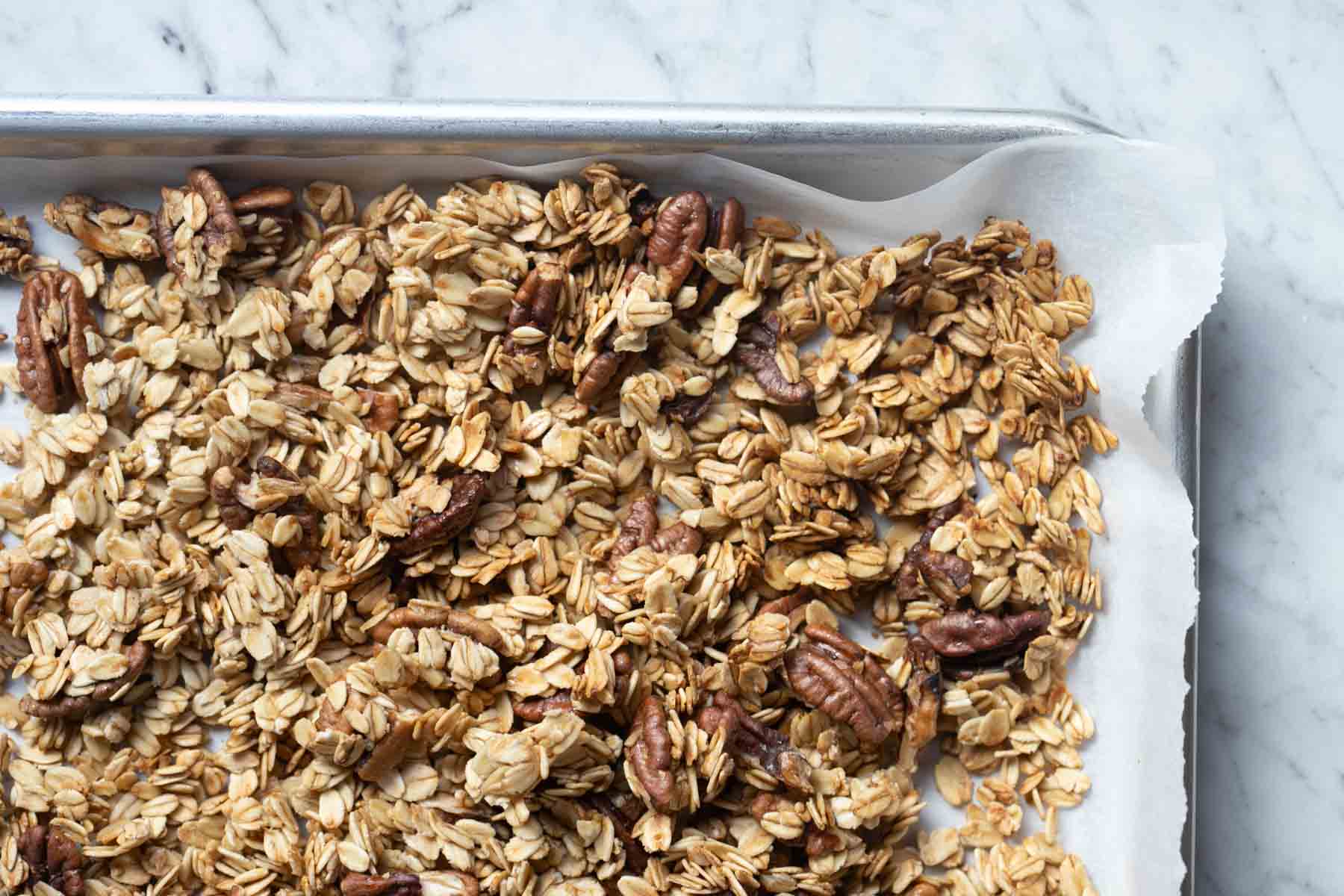 maple pecan granola in a pan.