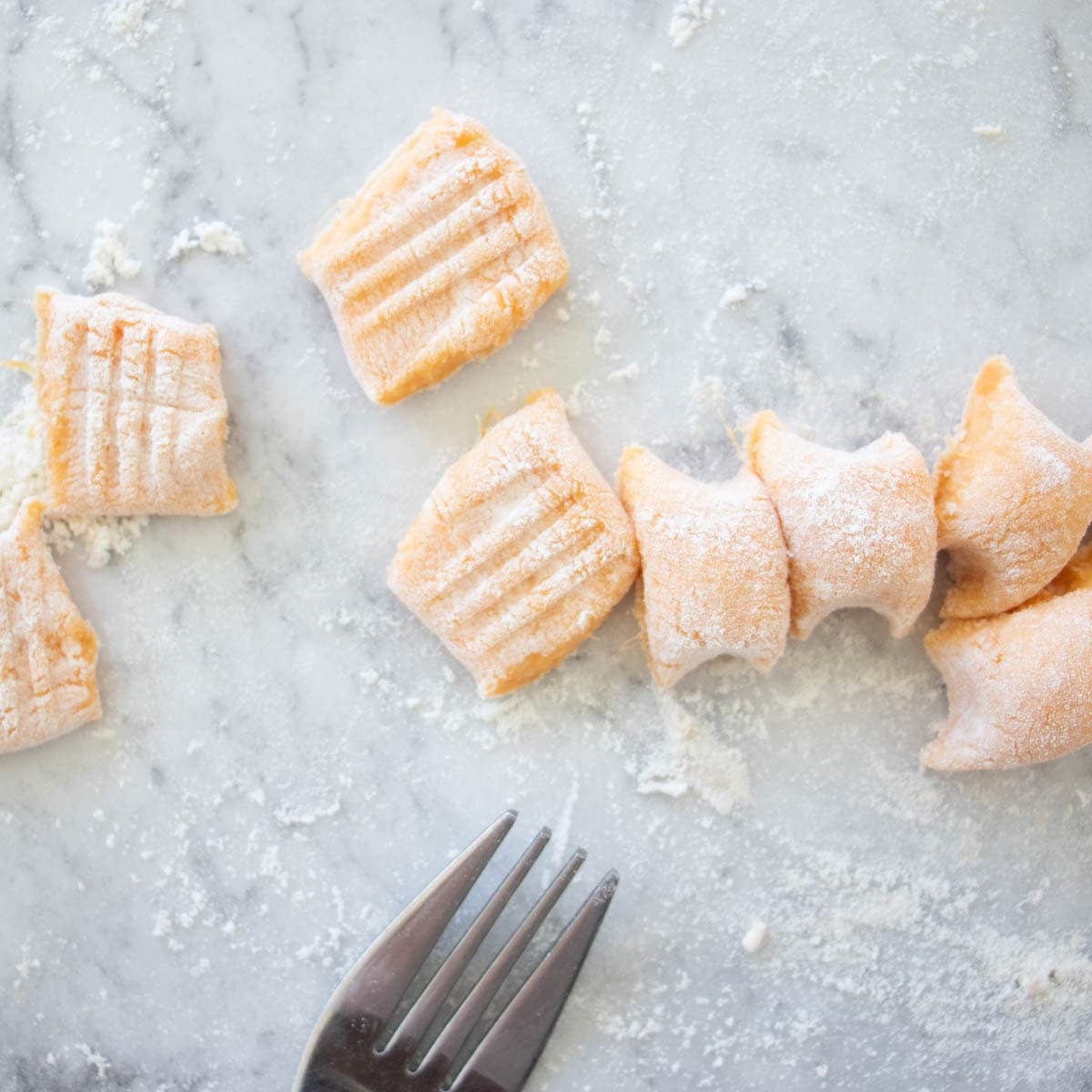 imprinting the sweet potato dough.