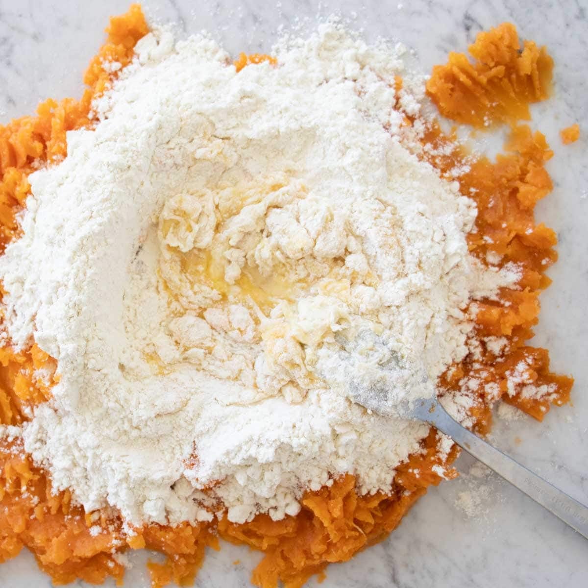 making the sweet potato dough.