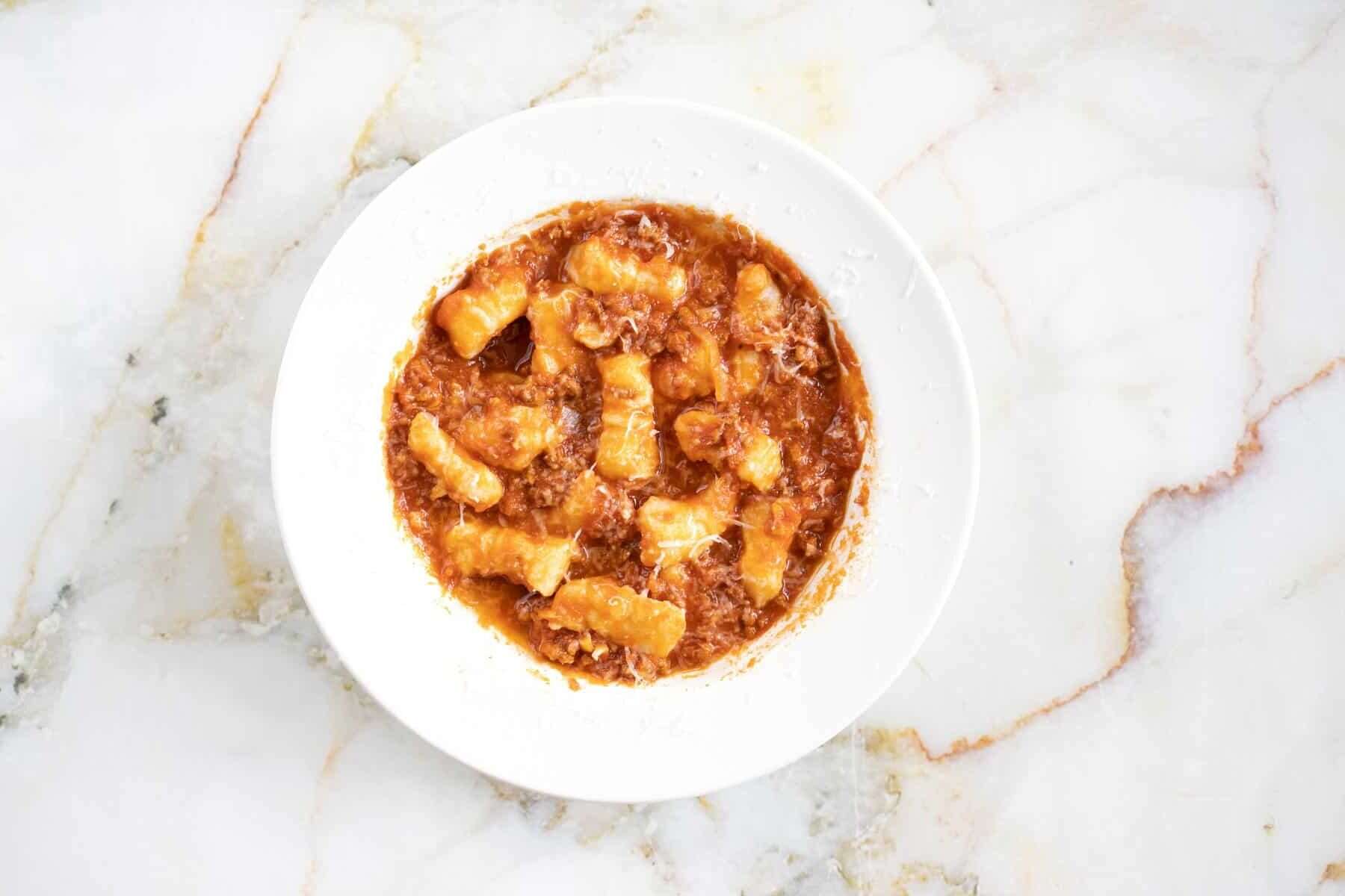 homemade potato gnocchi in a simple meat sauce with parmesan.