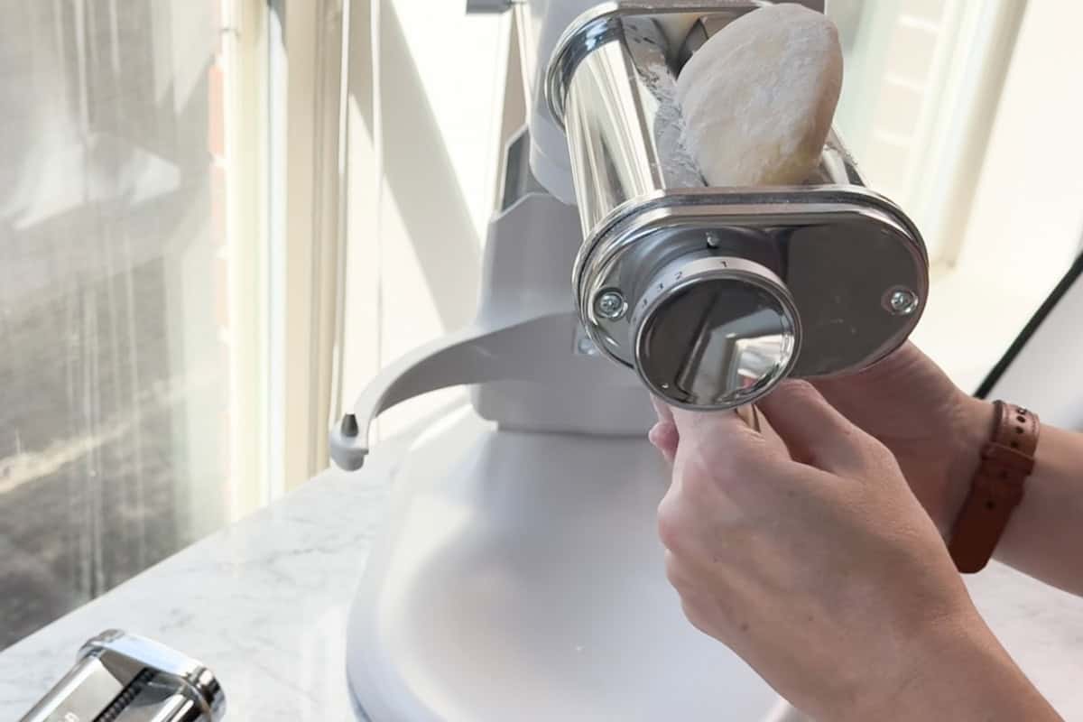 rolling the pasta dough.