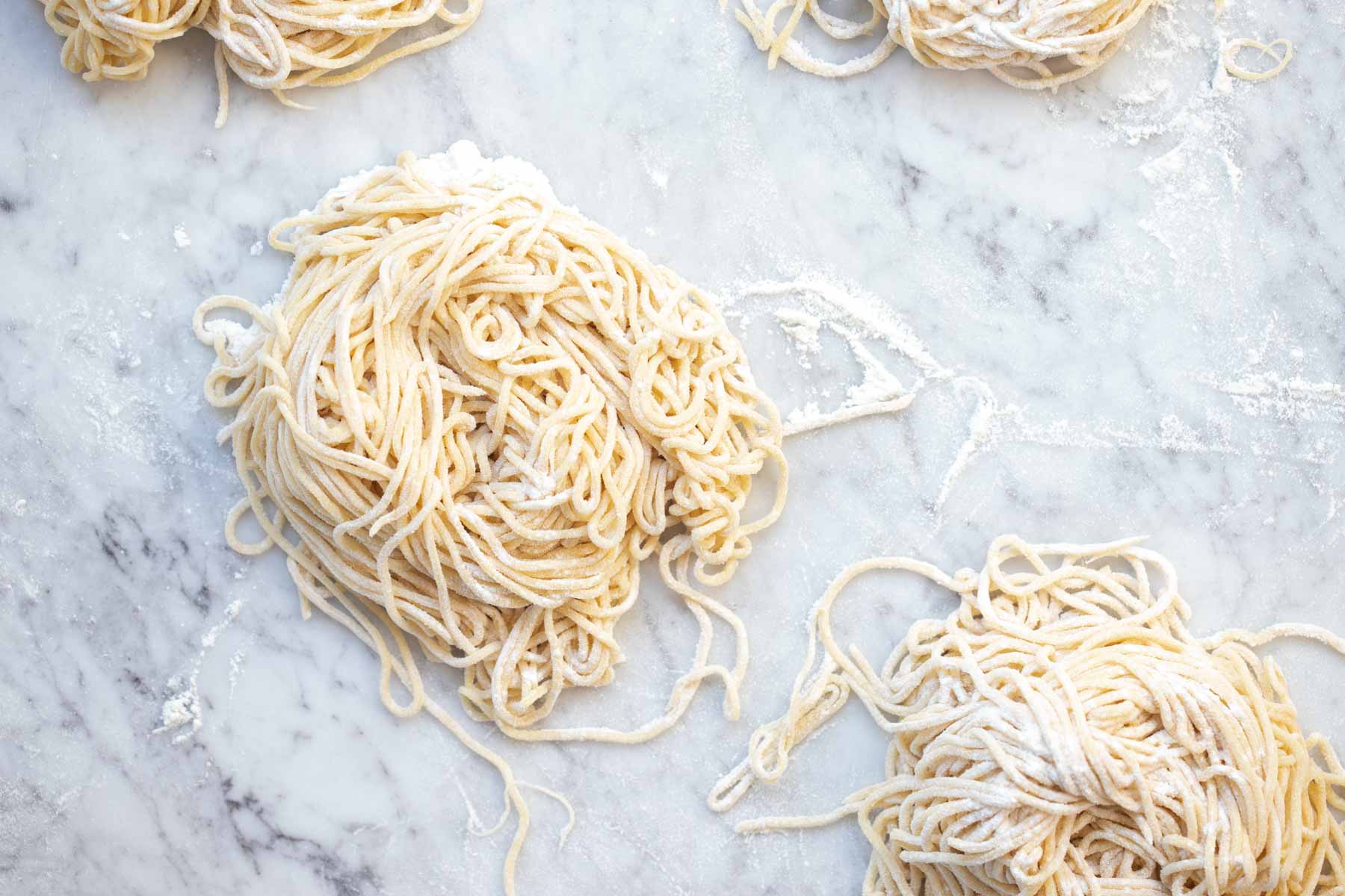 homemade spaghetti noodles with flour.