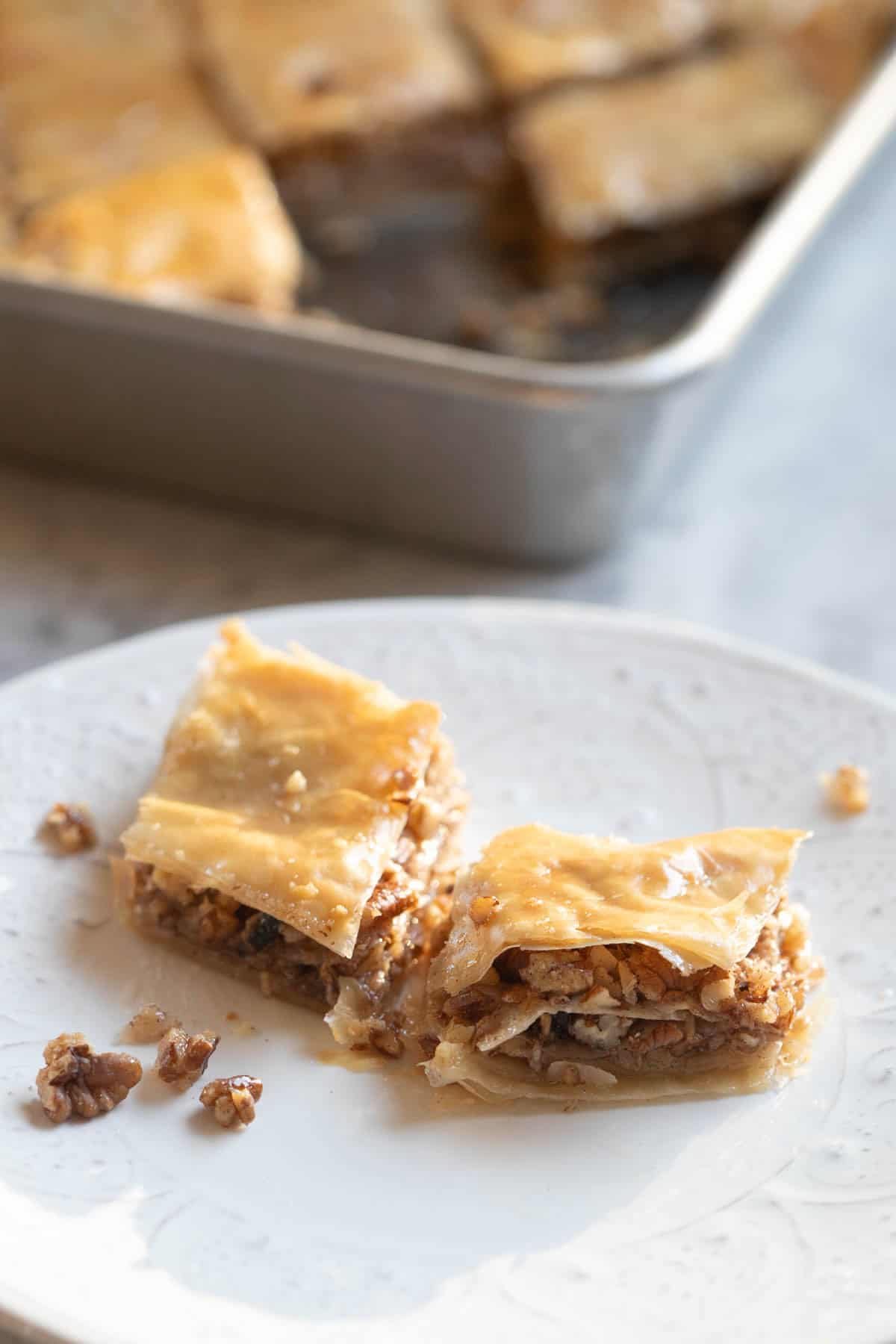 two pieces of cinnamon pecan baklava.