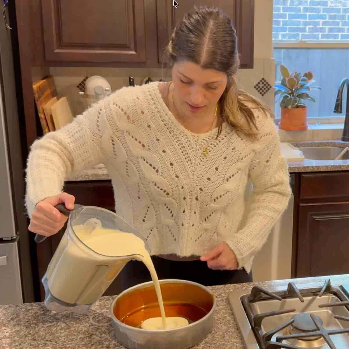 lily pouring the flan mixture into the caramel coated cake pan.