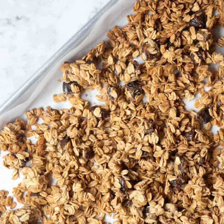 homemade tahini granola in a baking sheet.