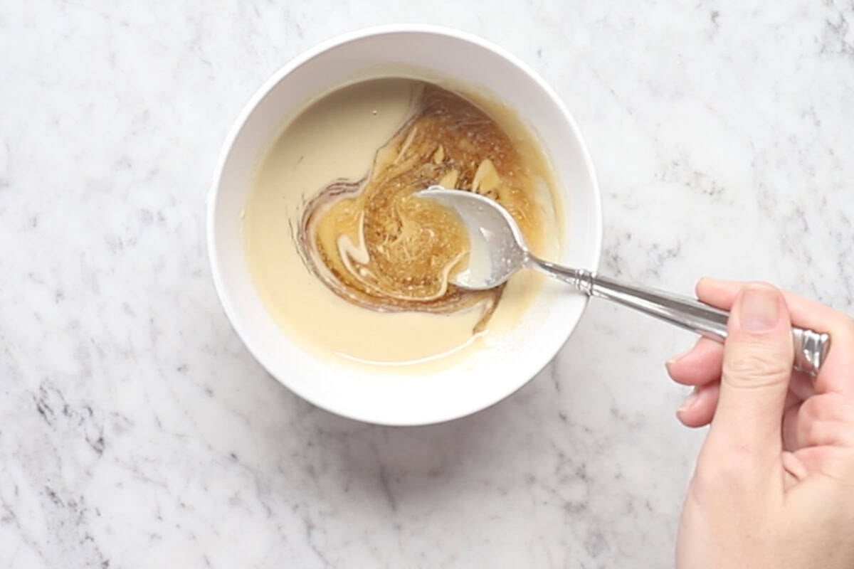mix the maple syrup and tahini together in a bowl.